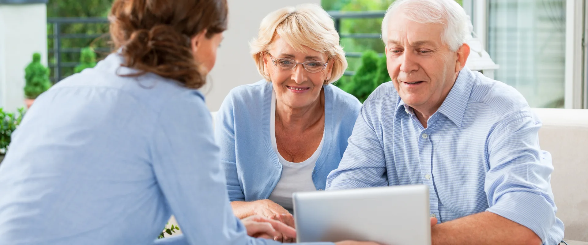An older couple meeting with an FCPC agent, reviewing options together — representing the clarity and comfort final expense coverage provides