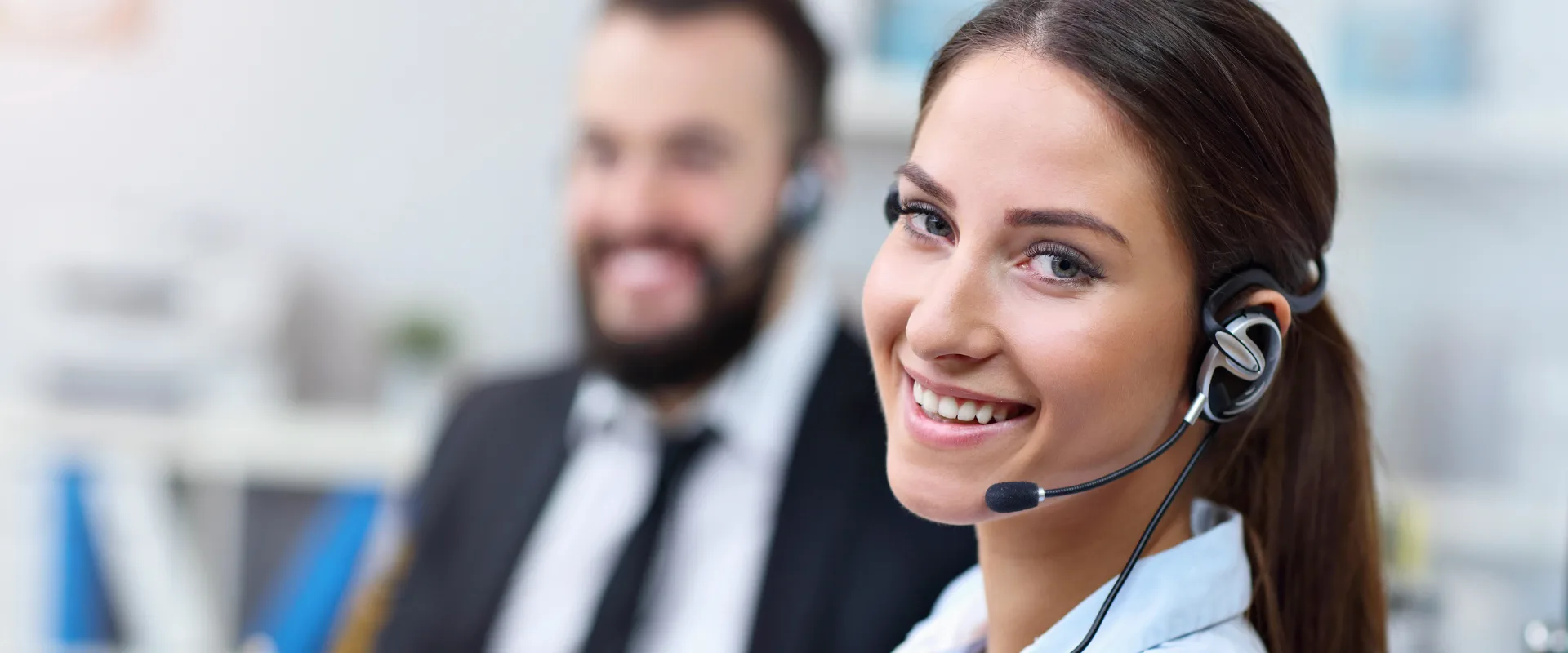 FCPC agent with headset, ready to help answer your questions