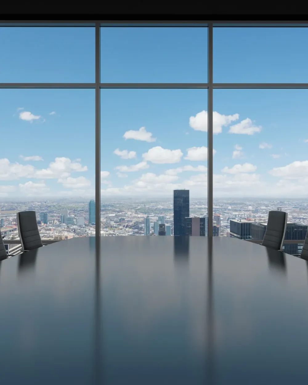 A boardroom with panoramic city views, representing FCPC's professional foundation