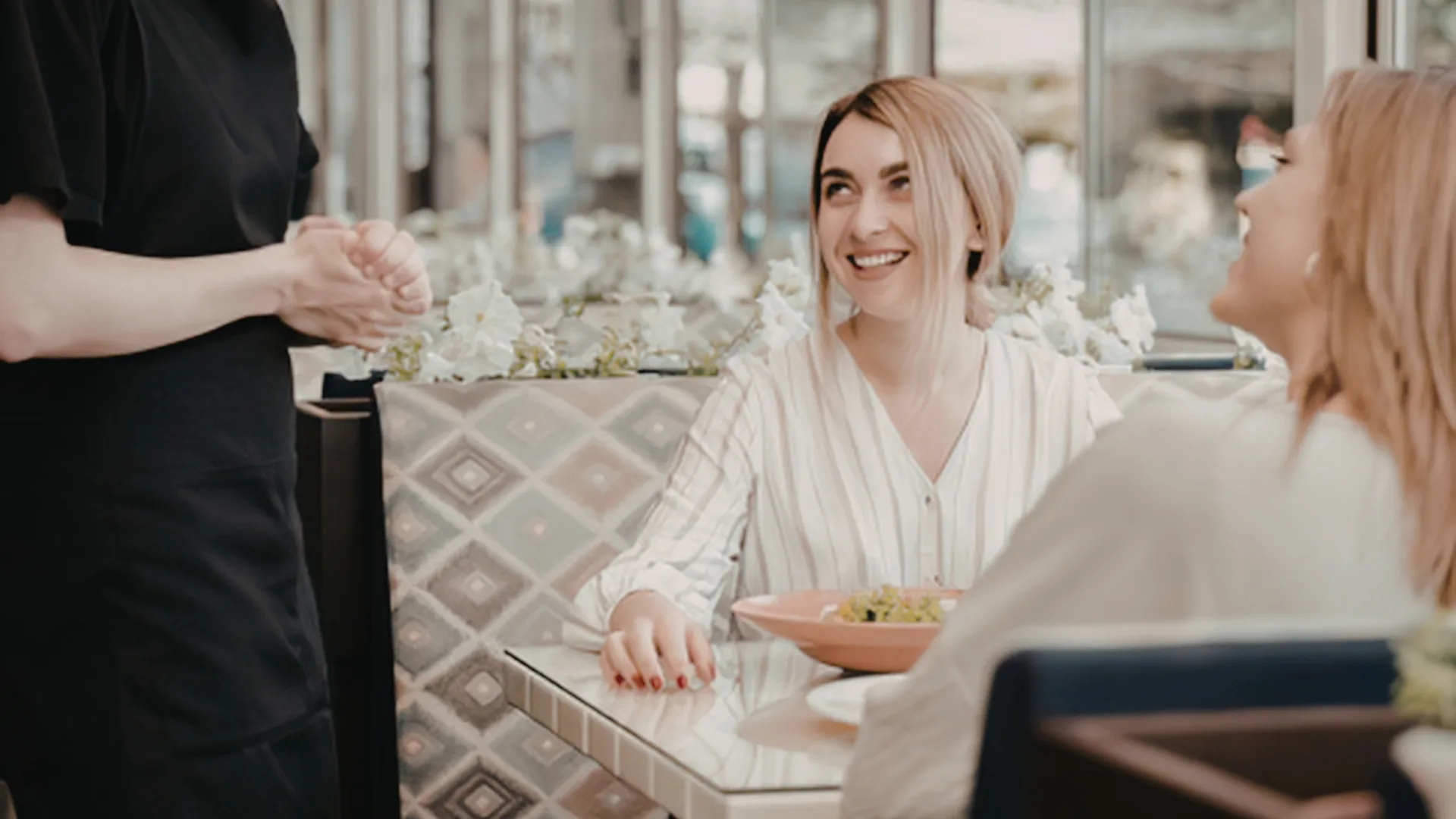 Two people shaking hands in a professional setting, representing the trusted partnership between FCPC agents and their clients