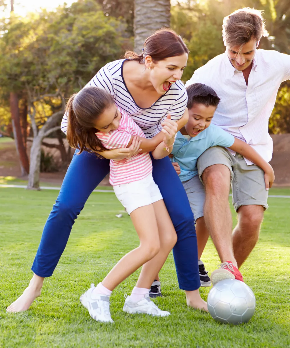 Family together at home — find the right amount of term life coverage for your family's needs