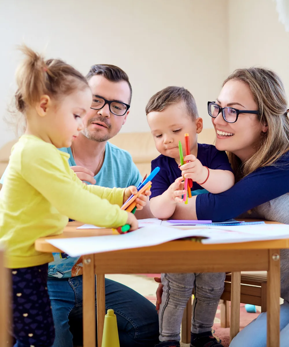 Young family at home — term life insurance protects your family during your highest-need years
