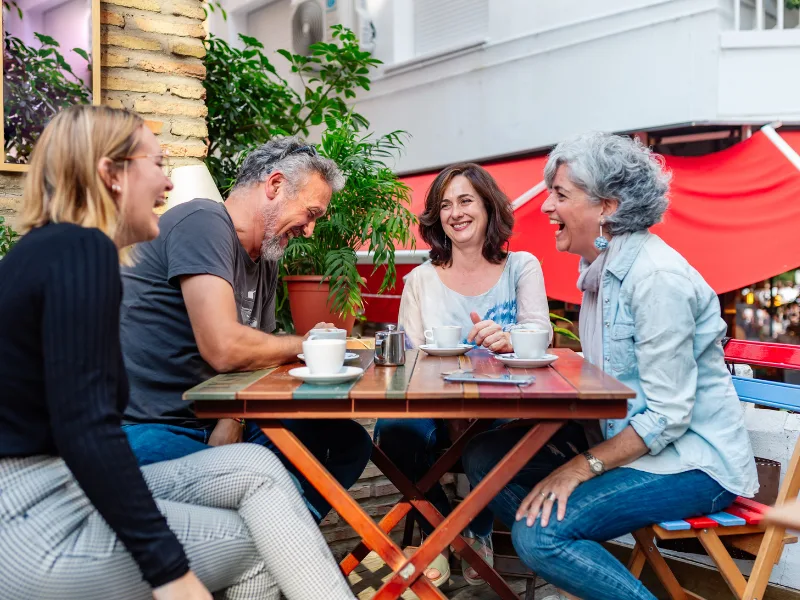 Person receiving support from loved ones — living benefits provide access to your policy during a serious illness